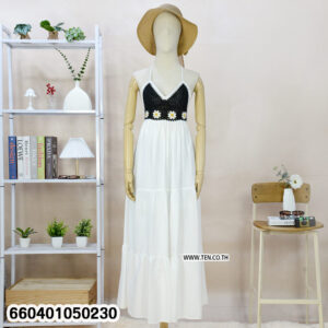 “Black crochet summer maxi dress with white skirt displayed on mannequin for beach fashion.”