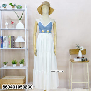 “Black crochet summer maxi dress with white skirt displayed on mannequin for beach fashion.”