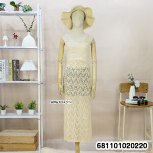 “White crochet beach cover up maxi dress with open-knit pattern by Ten Design.”