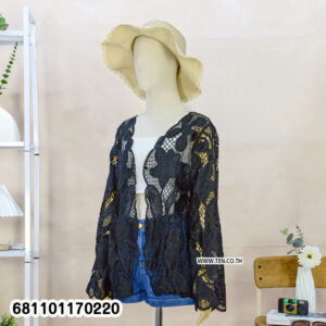 “Vintage leaf embroidered tops in black and white displayed for women’s fashion.”