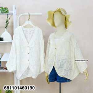 Elegant spiral sheer lace blouse with lightweight fabric, relaxed fit, and bohemian summer styling for beach and resort wear