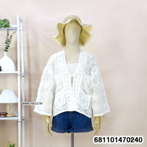 Graceful floral lace layer blouse with airy fabric, bohemian design, and relaxed fit styled for summer and resort wear