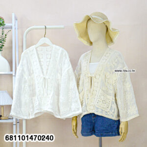 Graceful floral lace layer blouse with airy fabric, bohemian design, and relaxed fit styled for summer and resort wear