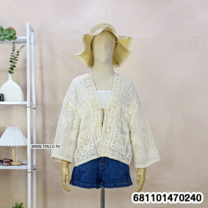 Graceful floral lace layer blouse with airy fabric, bohemian design, and relaxed fit styled for summer and resort wear