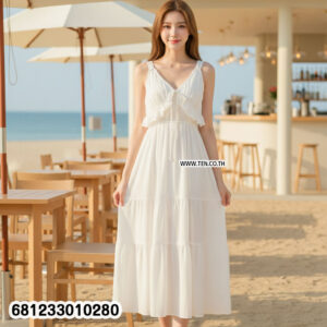 Sleeveless flowy white cotton maxi dress with ruffle neckline and lightweight fabric for summer and beachwear