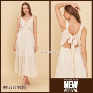 Sleeveless flowy white cotton maxi dress with ruffle neckline and lightweight fabric for summer and beachwear