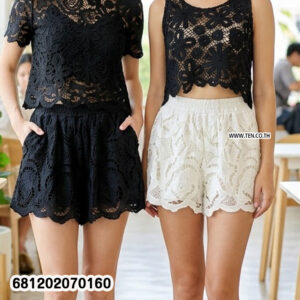 Vintage floral embroidery lace shorts in black and white with elastic waistband styled for summer beachwear and resort outfits