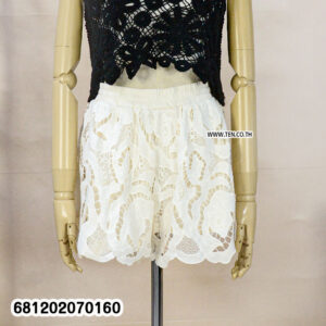 Vintage floral embroidery lace shorts in black and white with elastic waistband styled for summer beachwear and resort outfits