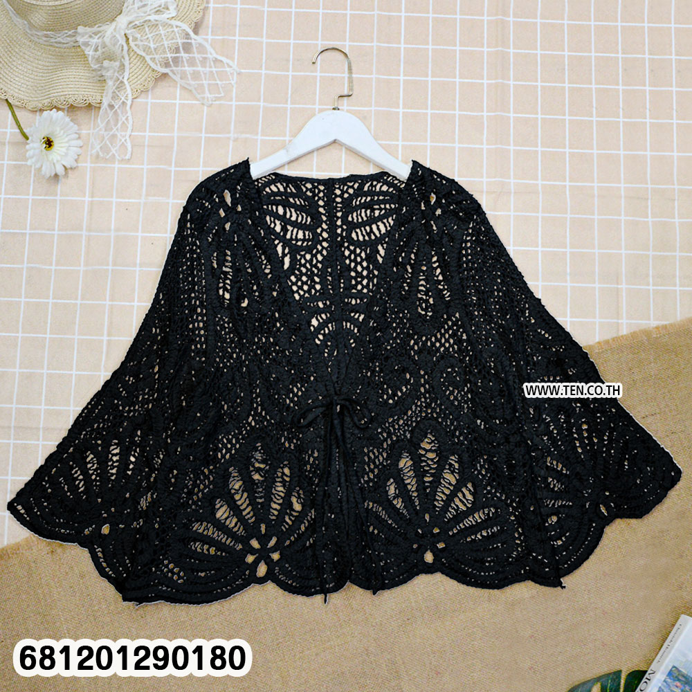 Vintage floral crochet lace vest in white with open knit pattern and bohemian summer design