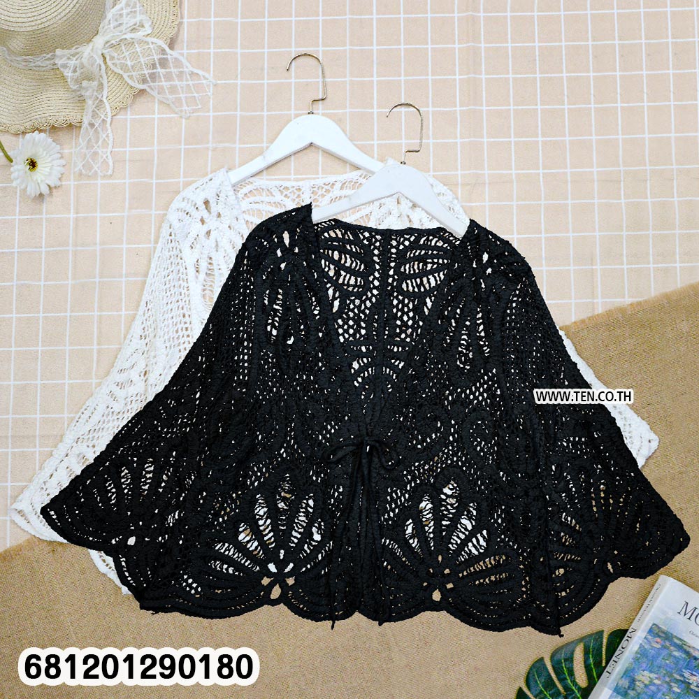 Vintage floral crochet lace vest in white with open knit pattern and bohemian summer design