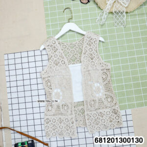 Handmade floral crochet layering vest in white, beige, and black open knit design for summer styling.