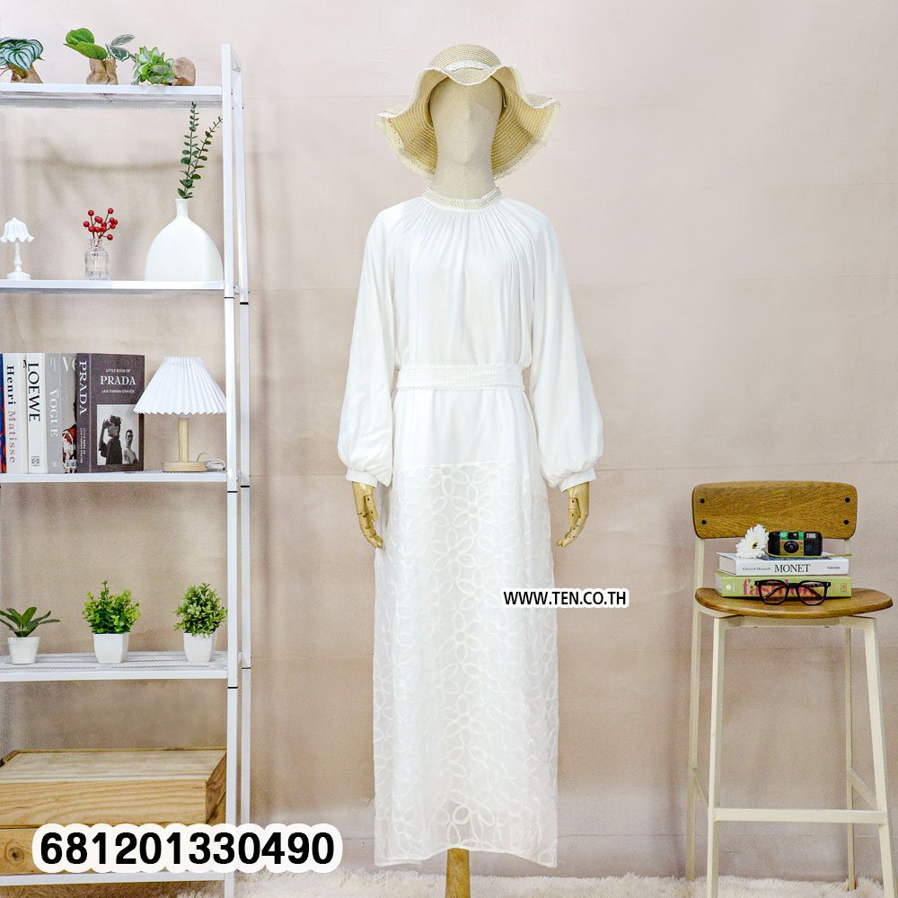 Minimalist monochrome crochet long dress in black and white with lace hem detail for summer resort wear
