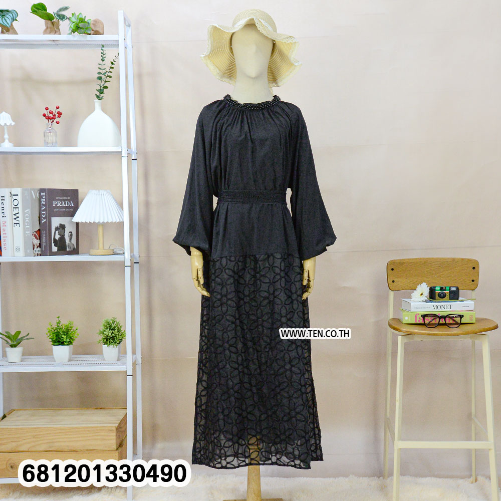 Minimalist monochrome crochet long dress in black and white with lace hem detail for summer resort wear