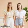 Sweet tiered ruffle crop top in soft cotton fabric with layered romantic summer design.