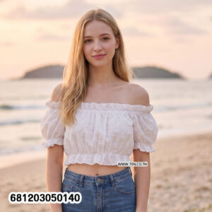 Romantic ruffle off shoulder top in white cotton eyelet fabric with elastic neckline and puff sleeves.