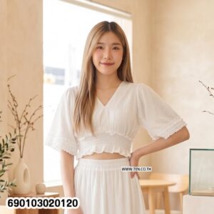 Elegant summer smock top for women with smocked waist and flowy sleeves, lightweight resort wear blouse for beach and tropical outfits